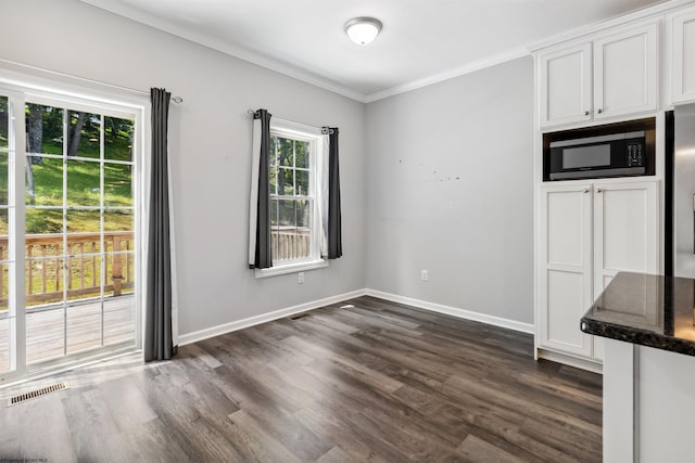 26 Misty Ln, Fairmont, WV 26554 - unfurnished dining area with crown molding and dark wood-type flooring