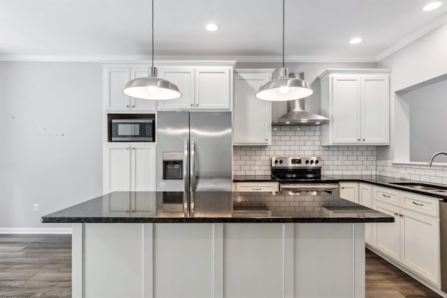 26 Misty Ln, Fairmont, WV 26554 - kitchen featuring appliances with stainless steel finishes, wall chimney range hood, ornamental molding, dark wood finished floors, and white cabinets
