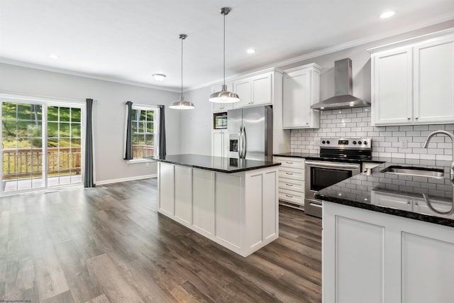 26 Misty Ln, Fairmont, WV 26554 - kitchen featuring wall chimney exhaust hood, appliances with stainless steel finishes, dark wood-type flooring, decorative backsplash, and ornamental molding