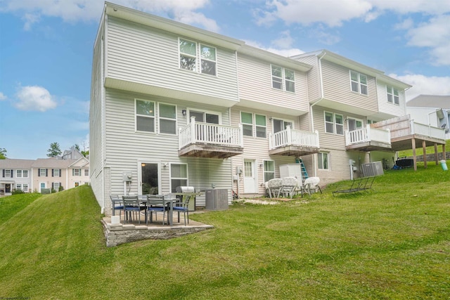 126 Auburn Dr, Morgantown, WV 26501 - rear view of property with a lawn and a patio area