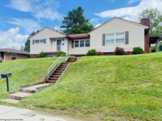 222 Blackwell St, Bridgeport, WV 26330 - ranch-style house featuring a chimney and a front yard
