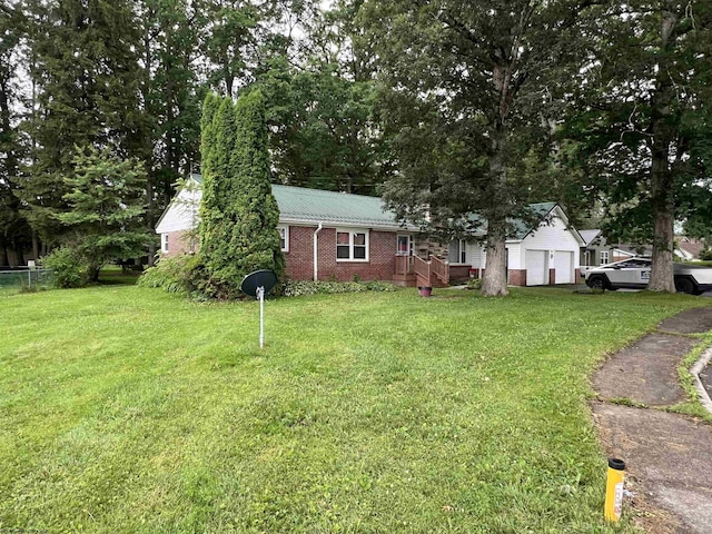 101 Wilson St, Elkins, WV 26241 - view of grassy yard with an attached garage