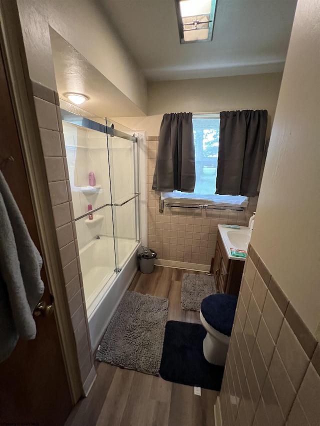 101 Wilson St, Elkins, WV 26241 - bathroom featuring wood finished floors, vanity, and enclosed tub / shower combo