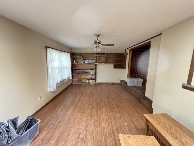 101 Wilson St, Elkins, WV 26241 - unfurnished living room featuring ceiling fan and light wood-style flooring