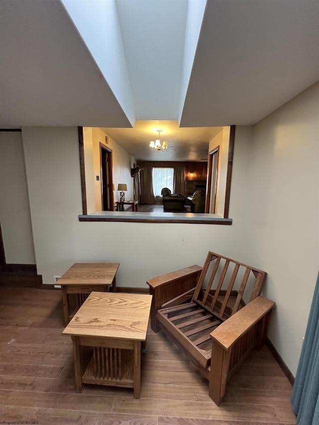 101 Wilson St, Elkins, WV 26241 - sitting room featuring wood finished floors and a chandelier