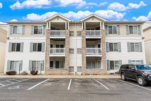 3208 University Commons Dr Unit 2, Star City, WV 26505 - view of building exterior featuring uncovered parking