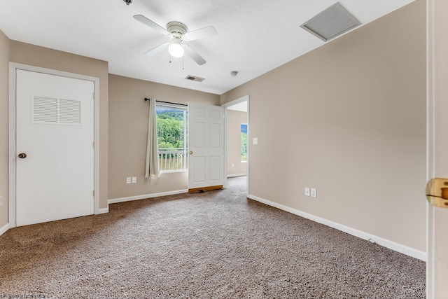 3208 University Commons Dr Unit 2, Star City, WV 26505 - spare room featuring a ceiling fan, carpet flooring, and a smoke detector