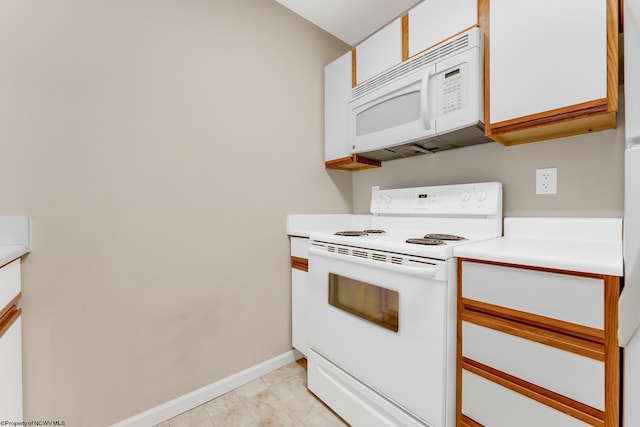 3208 University Commons Dr Unit 2, Star City, WV 26505 - kitchen with white appliances, white cabinets, and light countertops