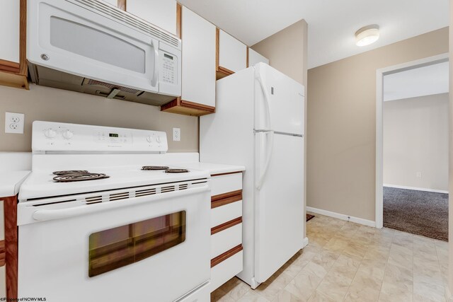 3208 University Commons Dr Unit 2, Star City, WV 26505 - kitchen with white appliances, white cabinetry, and light countertops