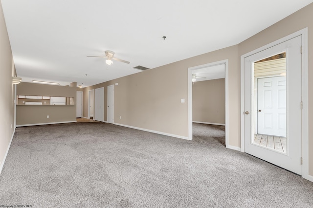 3208 University Commons Dr Unit 2, Star City, WV 26505 - unfurnished living room featuring ceiling fan and carpet flooring