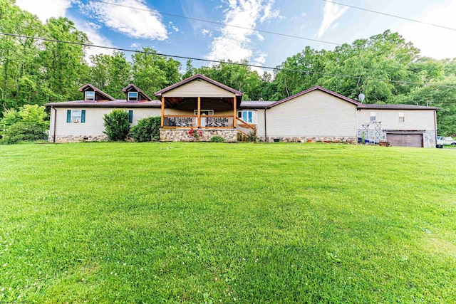 482 Buckeye Rd, Core, WV 26541 - rear view of house with a lawn and a garage