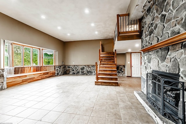 482 Buckeye Rd, Core, WV 26541 - living area with stairway, recessed lighting, light tile patterned floors, and a stone fireplace