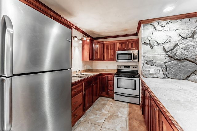 482 Buckeye Rd, Core, WV 26541 - kitchen featuring stainless steel appliances, tile counters, ornamental molding, light tile patterned flooring, and arched walkways