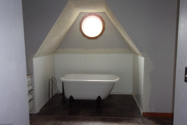 208 Parkview Cir, Kingwood, WV 26537 - bathroom featuring a freestanding tub and vaulted ceiling