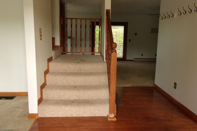 208 Parkview Cir, Kingwood, WV 26537 - stairs with a baseboard radiator and wood finished floors
