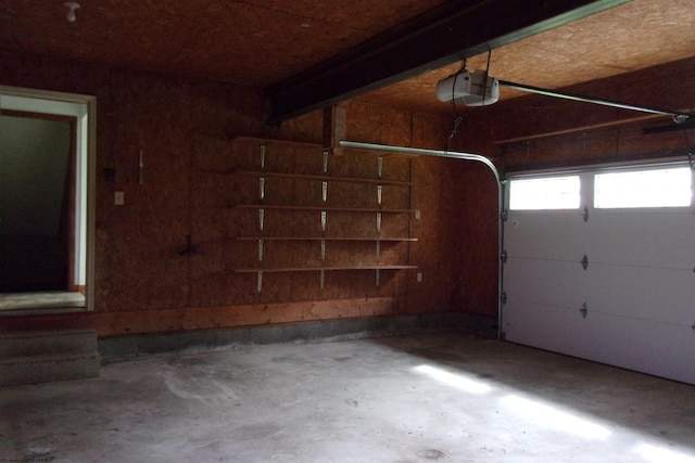 208 Parkview Cir, Kingwood, WV 26537 - garage featuring a garage door opener