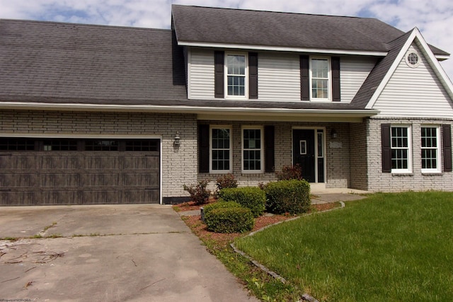 208 Parkview Cir, Kingwood, WV 26537 - view of front facade featuring concrete driveway, a front lawn, and brick siding