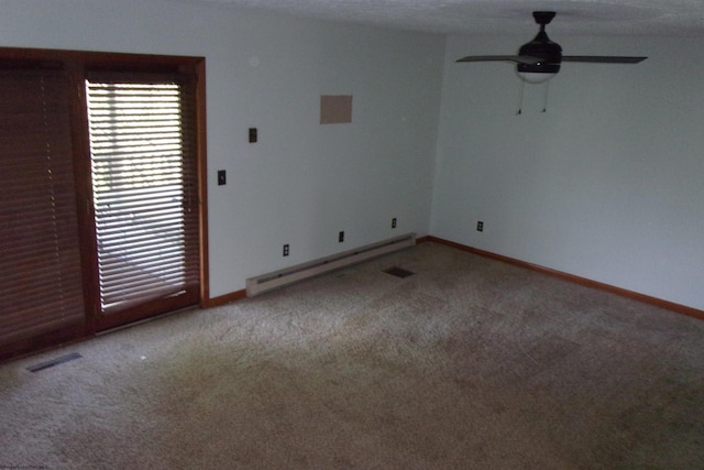 208 Parkview Cir, Kingwood, WV 26537 - carpeted empty room with a baseboard radiator and ceiling fan
