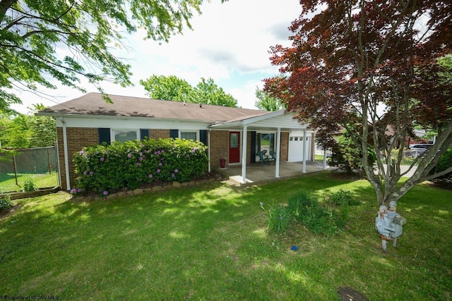 103 Apolla Dr, Morgantown, WV 26505 - back of house featuring brick siding and a garage