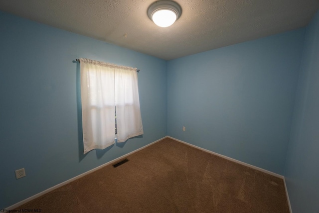 103 Apolla Dr, Morgantown, WV 26505 - carpeted empty room featuring baseboards and a textured ceiling