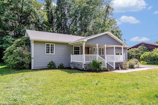 1005 Primrose Ln, Morgantown, WV 26505 - view of front of property featuring covered porch, a front yard, and a shingled roof