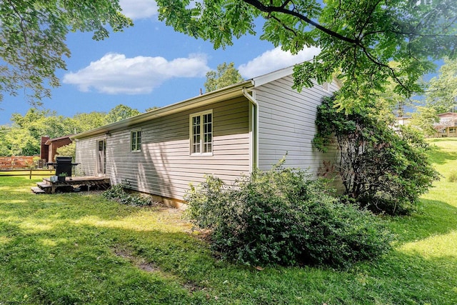 1005 Primrose Ln, Morgantown, WV 26505 - view of side of property featuring a yard and a wooden deck