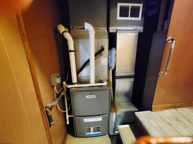 704 S Stewart St, Shinnston, WV 26431 - utility room with heating unit