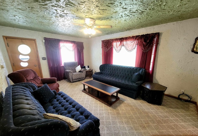 704 S Stewart St, Shinnston, WV 26431 - carpeted living area with a textured wall and ceiling fan