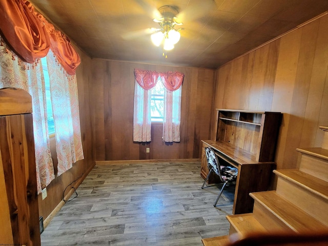 704 S Stewart St, Shinnston, WV 26431 - unfurnished office featuring ceiling fan, wood finished floors, and wooden walls