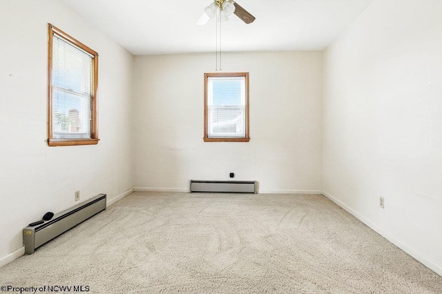 2300 Pride Ave, Clarksburg, WV 26301 - carpeted empty room featuring a baseboard heating unit and a ceiling fan