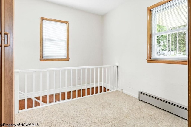 2300 Pride Ave, Clarksburg, WV 26301 - unfurnished bedroom with a baseboard heating unit and carpet