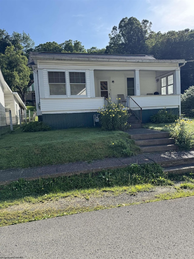 506 Broad St, Weston, WV 26452 - view of front facade featuring covered porch
