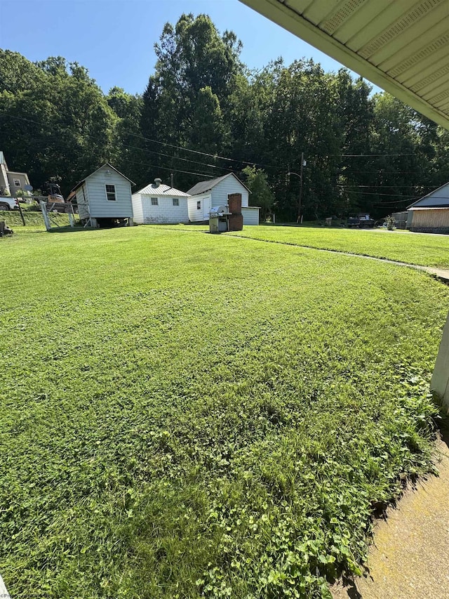 506 Broad St, Weston, WV 26452 - view of green lawn with view of wooded area