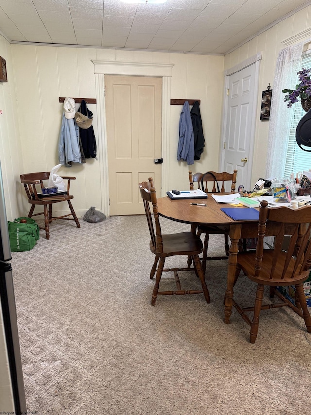 506 Broad St, Weston, WV 26452 - carpeted dining space featuring a decorative wall