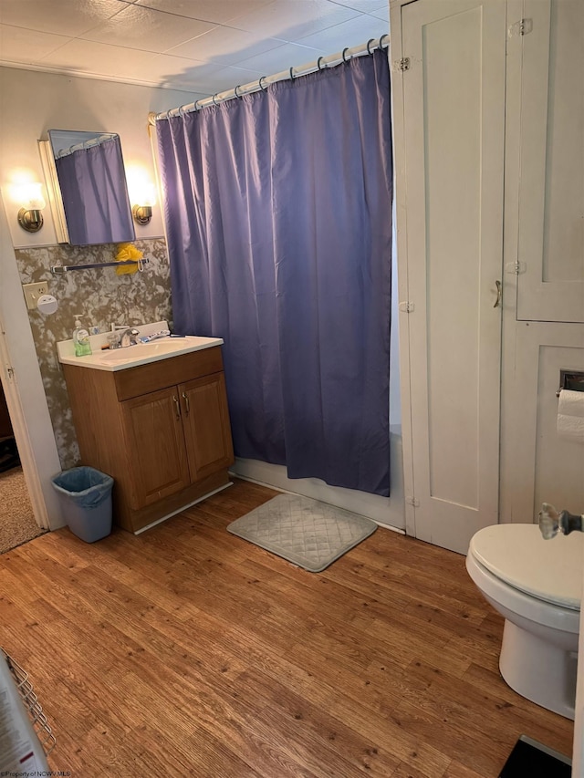506 Broad St, Weston, WV 26452 - full bathroom featuring wood finished floors, vanity, and shower / bath combination with curtain