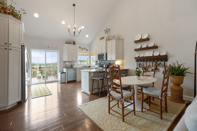 211 Berkshire Cir, Bridgeport, WV 26330 - dining space with a chandelier, dark wood-style flooring, high vaulted ceiling, and recessed lighting