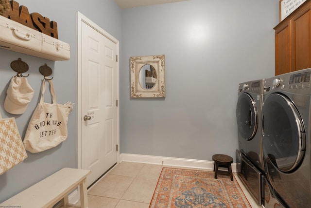 211 Berkshire Cir, Bridgeport, WV 26330 - washroom featuring independent washer and dryer, cabinet space, and light tile patterned floors