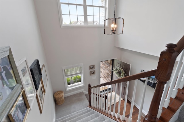 211 Berkshire Cir, Bridgeport, WV 26330 - stairway with a towering ceiling and a chandelier