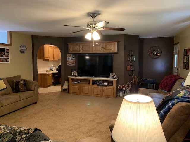 52 Ladder Dr, Mount Clare, WV 26408 - living room featuring a ceiling fan, arched walkways, and light carpet