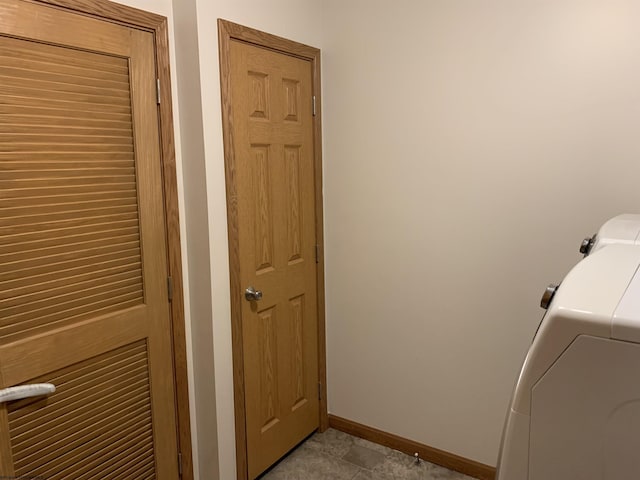 52 Ladder Dr, Mount Clare, WV 26408 - washroom featuring baseboards and washer and dryer