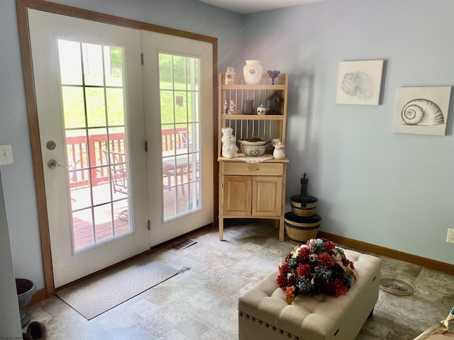 52 Ladder Dr, Mount Clare, WV 26408 - doorway to outside featuring baseboards and stone finish flooring