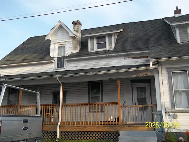 301 Virginia Ave Unit 2, Grafton, WV 26351 - view of front of property with a porch, a shingled roof, and a chimney