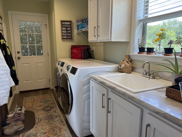 114 Snowy Ridge Rd, Terra Alta, WV 26764 - laundry room featuring cabinet space, washing machine and dryer, and wood finished floors