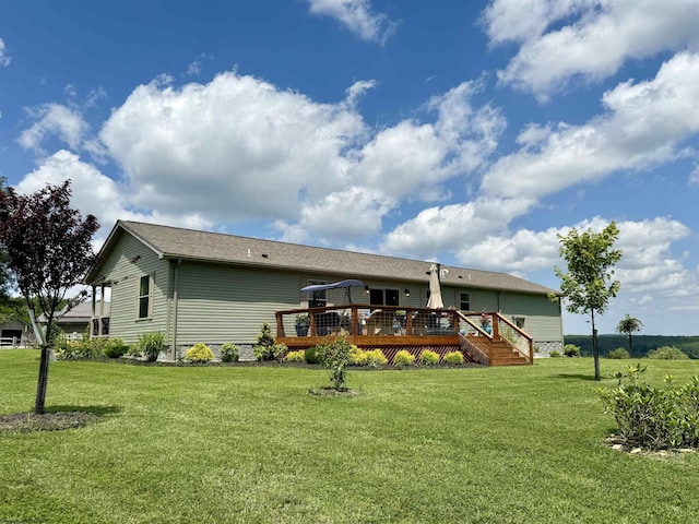 114 Snowy Ridge Rd, Terra Alta, WV 26764 - back of house featuring a wooden deck and a yard