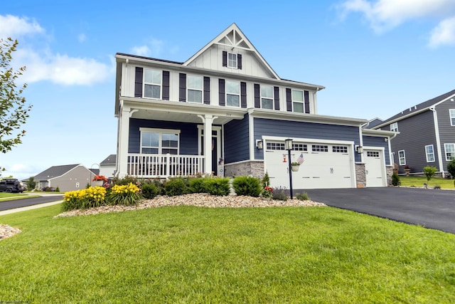 204 Falling Water Ln, Morgantown, WV 26508 - craftsman inspired home featuring covered porch, a front yard, board and batten siding, driveway, and stone siding