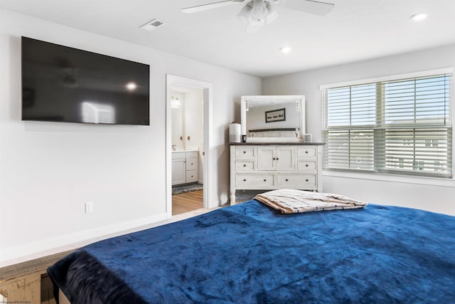 204 Falling Water Ln, Morgantown, WV 26508 - bedroom featuring ensuite bath, wood finished floors, and a ceiling fan