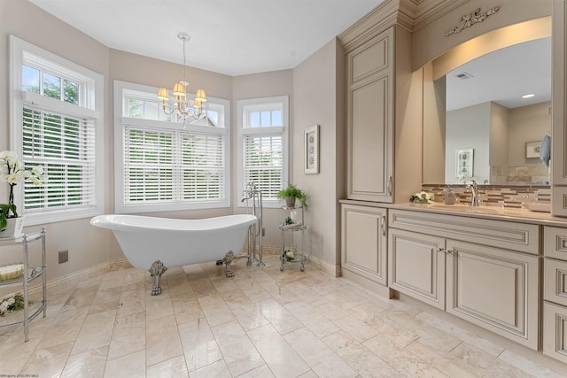 1009 Summit Dr, Morgantown, WV 26508 - full bathroom featuring a freestanding tub, vanity, a chandelier, and marble finish floors
