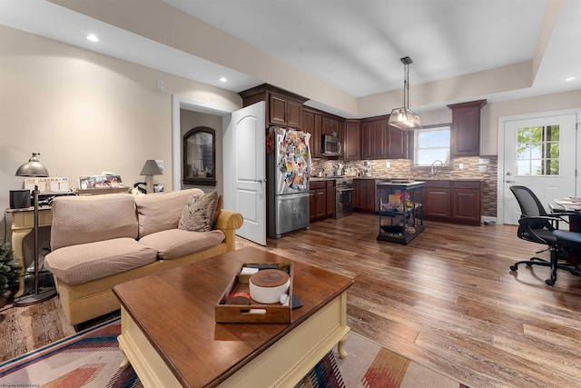 1009 Summit Dr, Morgantown, WV 26508 - living area with dark wood-style flooring, an office area, and recessed lighting