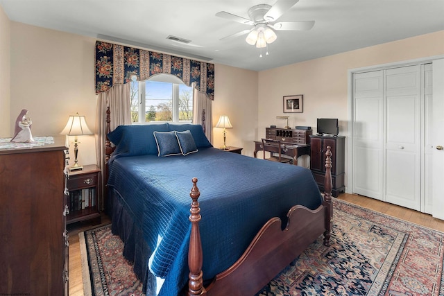 1348 Anderson Ave, Morgantown, WV 26505 - bedroom with wood-type flooring, a closet, and a ceiling fan