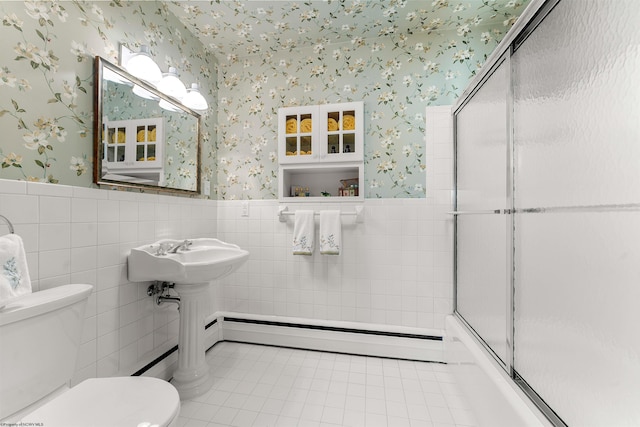 1348 Anderson Ave, Morgantown, WV 26505 - full bathroom with wallpapered walls, wainscoting, tile patterned flooring, tile walls, and baseboard heating